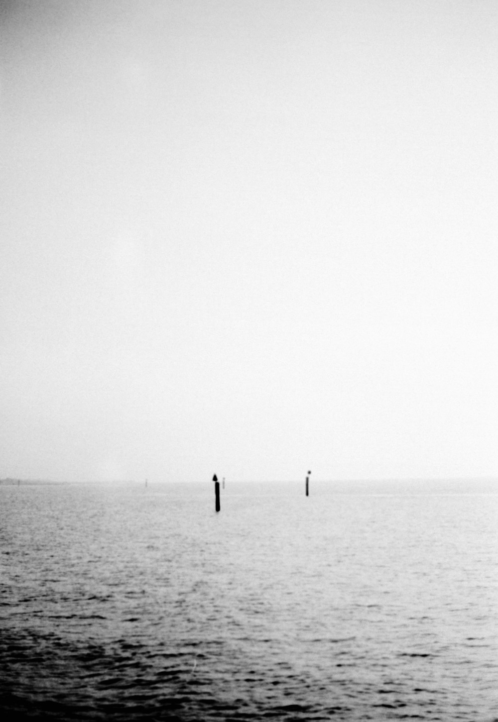 a black and white photo of a body of water