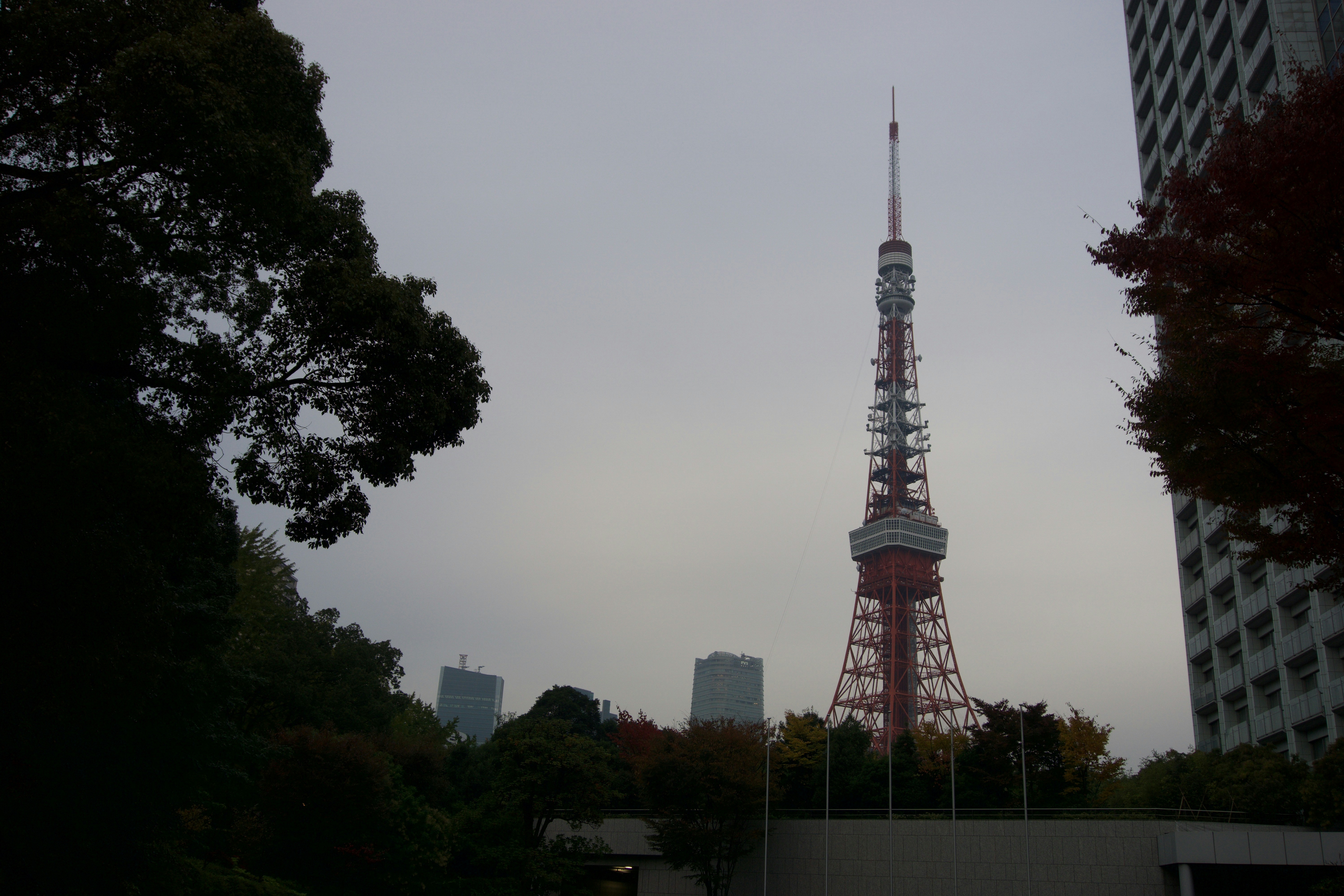 a very tall tower towering over a city
