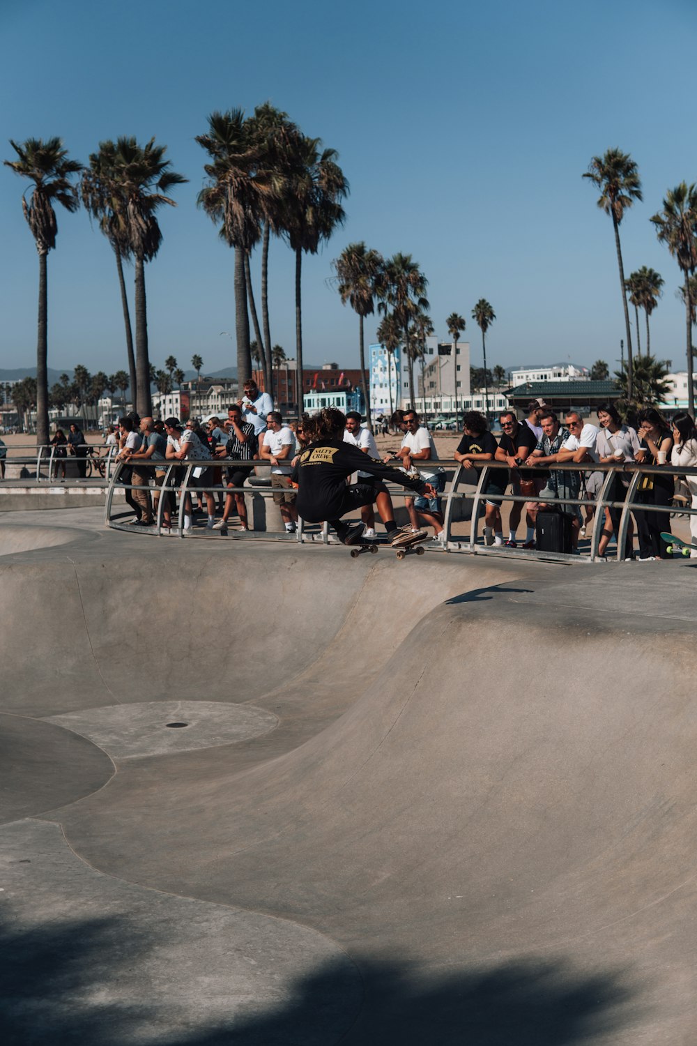 a man riding a skateboard up the side of a ramp