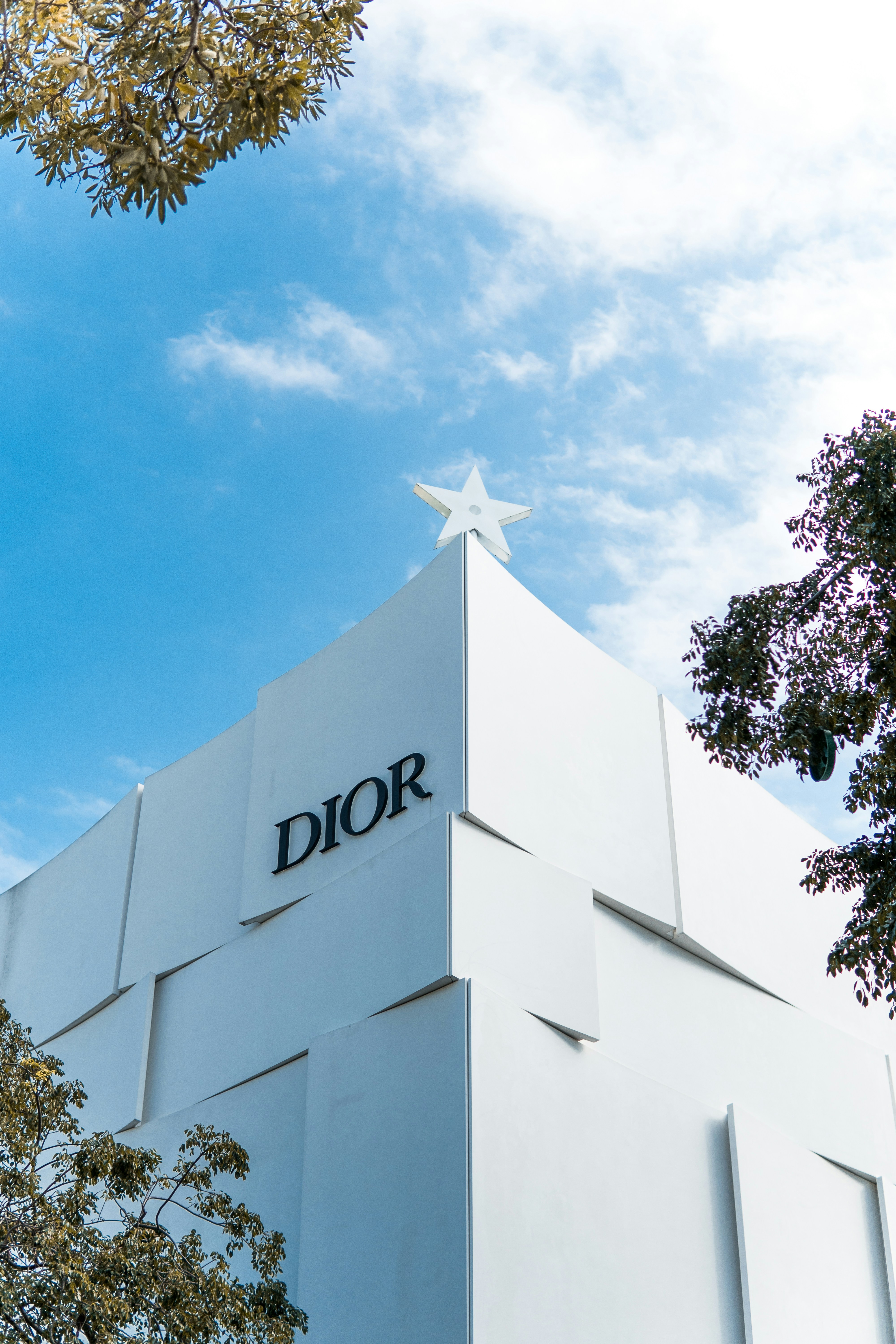 a white building with a star on the top of it