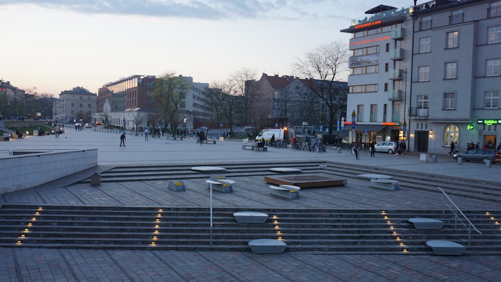a square with steps and benches in the middle of it