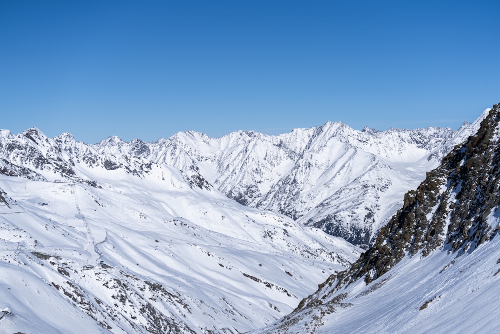 a person on skis on a snowy mountain