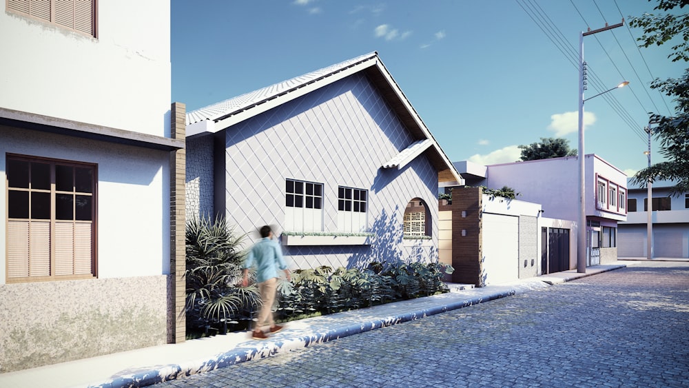 a man walking down a street next to a house