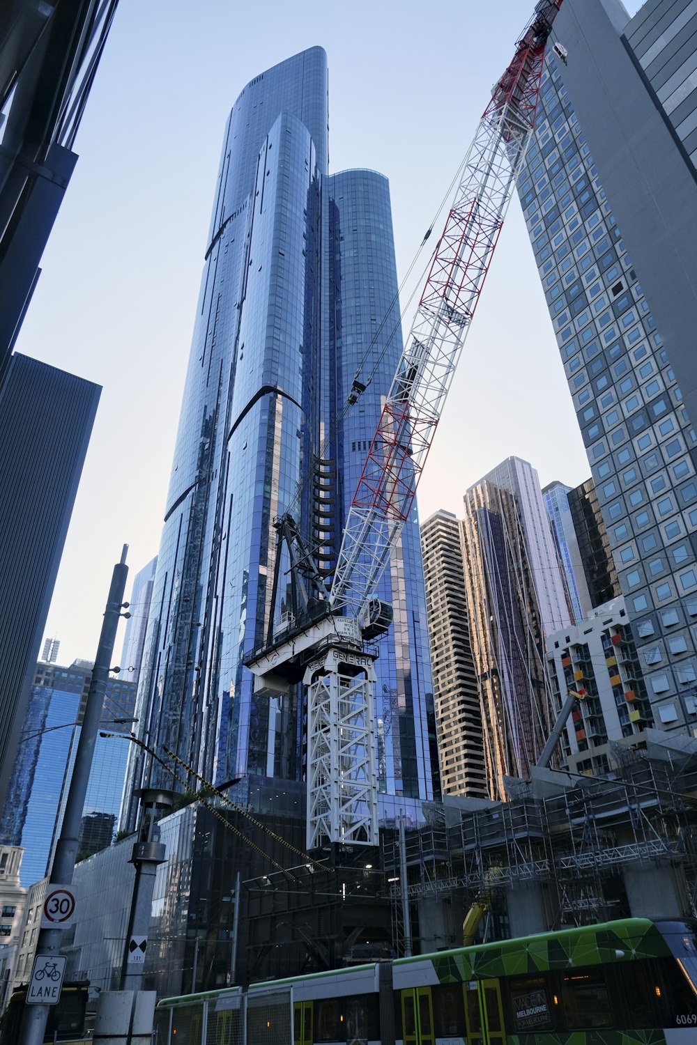 a large crane in the middle of a city