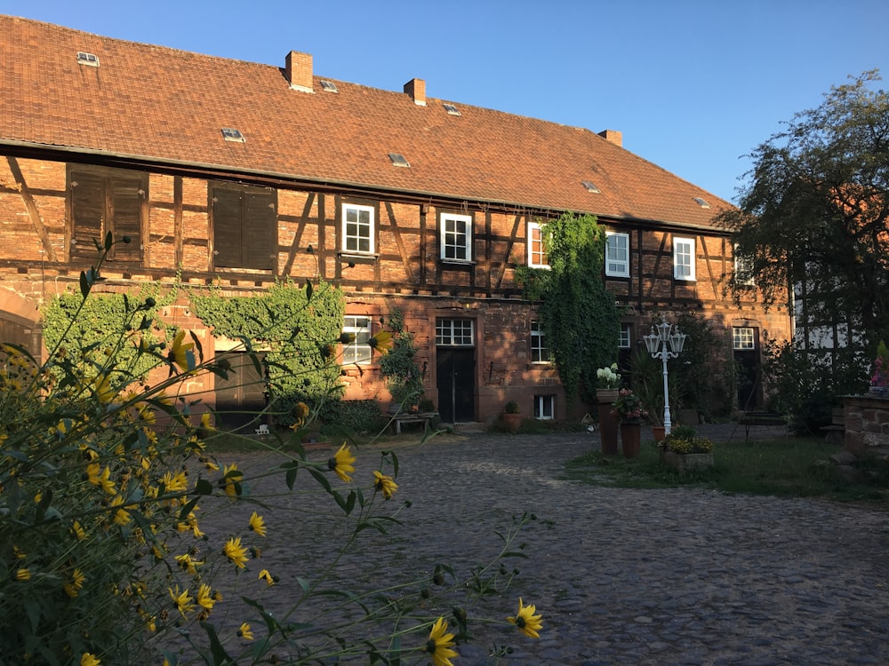 a large brick building with lots of windows