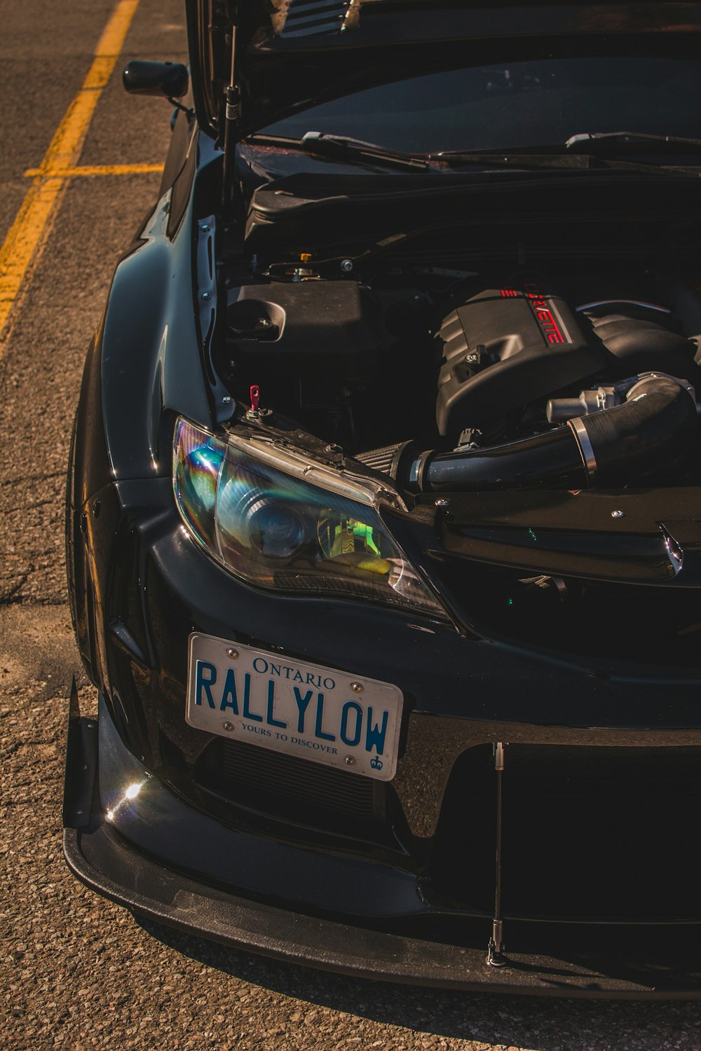 a close up of a car with its hood open