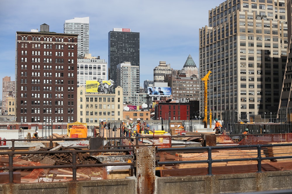 a view of a city with tall buildings in the background