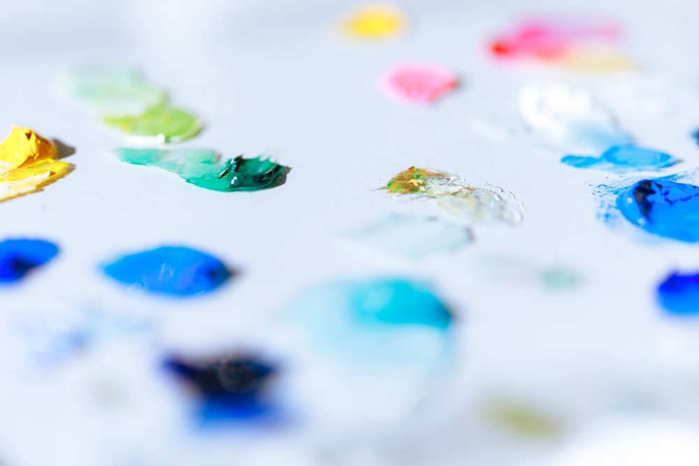 a close up of a bunch of paint on a table