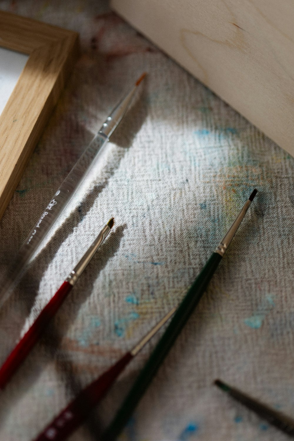 a close up of a box of paint and a pair of scissors