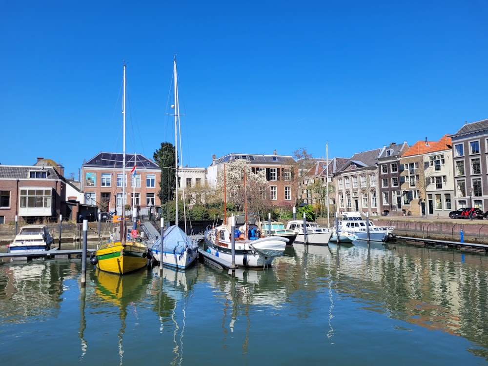 a group of boats that are sitting in the water