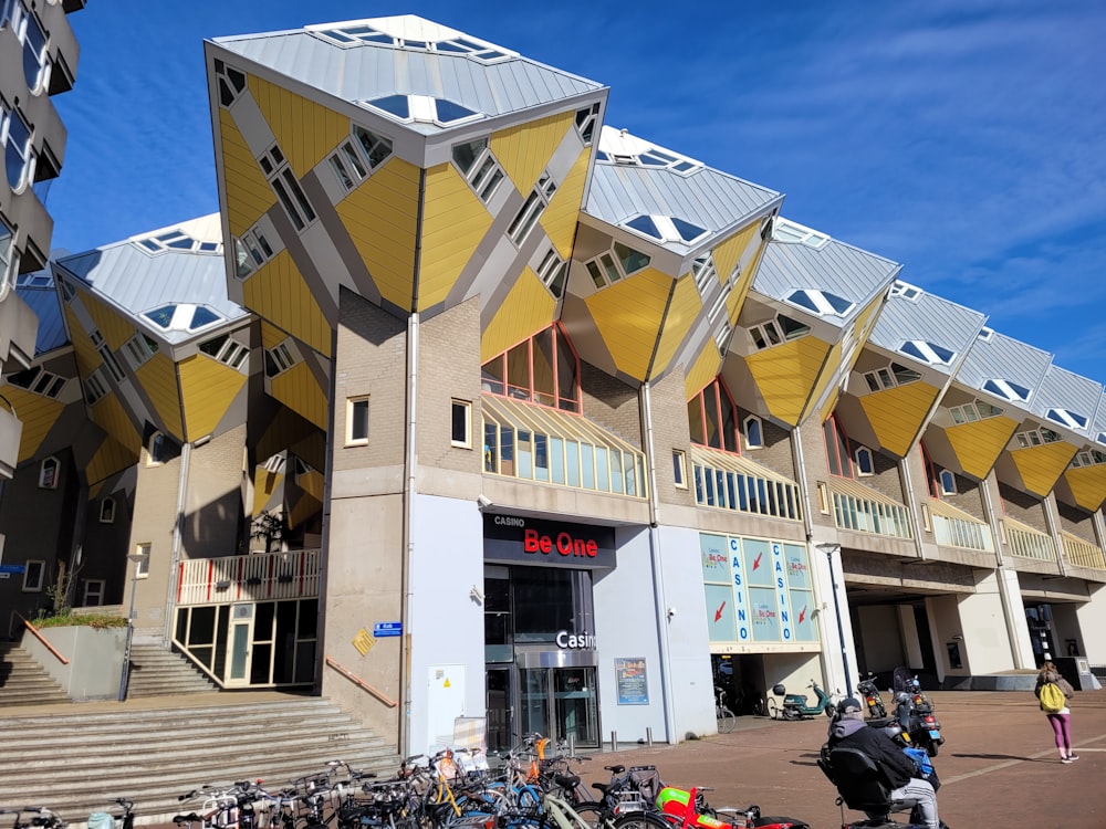 a group of bikes parked in front of a building