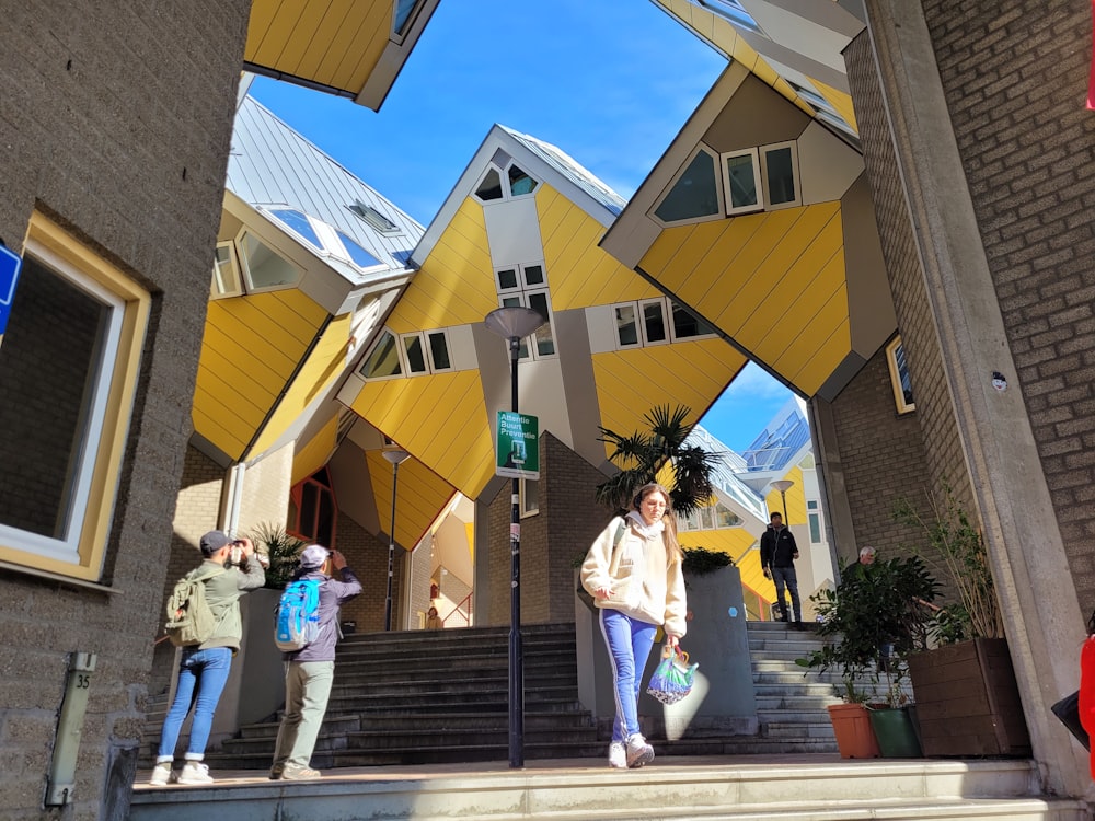 a group of people walking up a flight of stairs