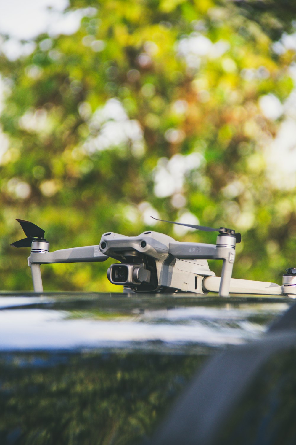 a close up of a remote control device on top of a car