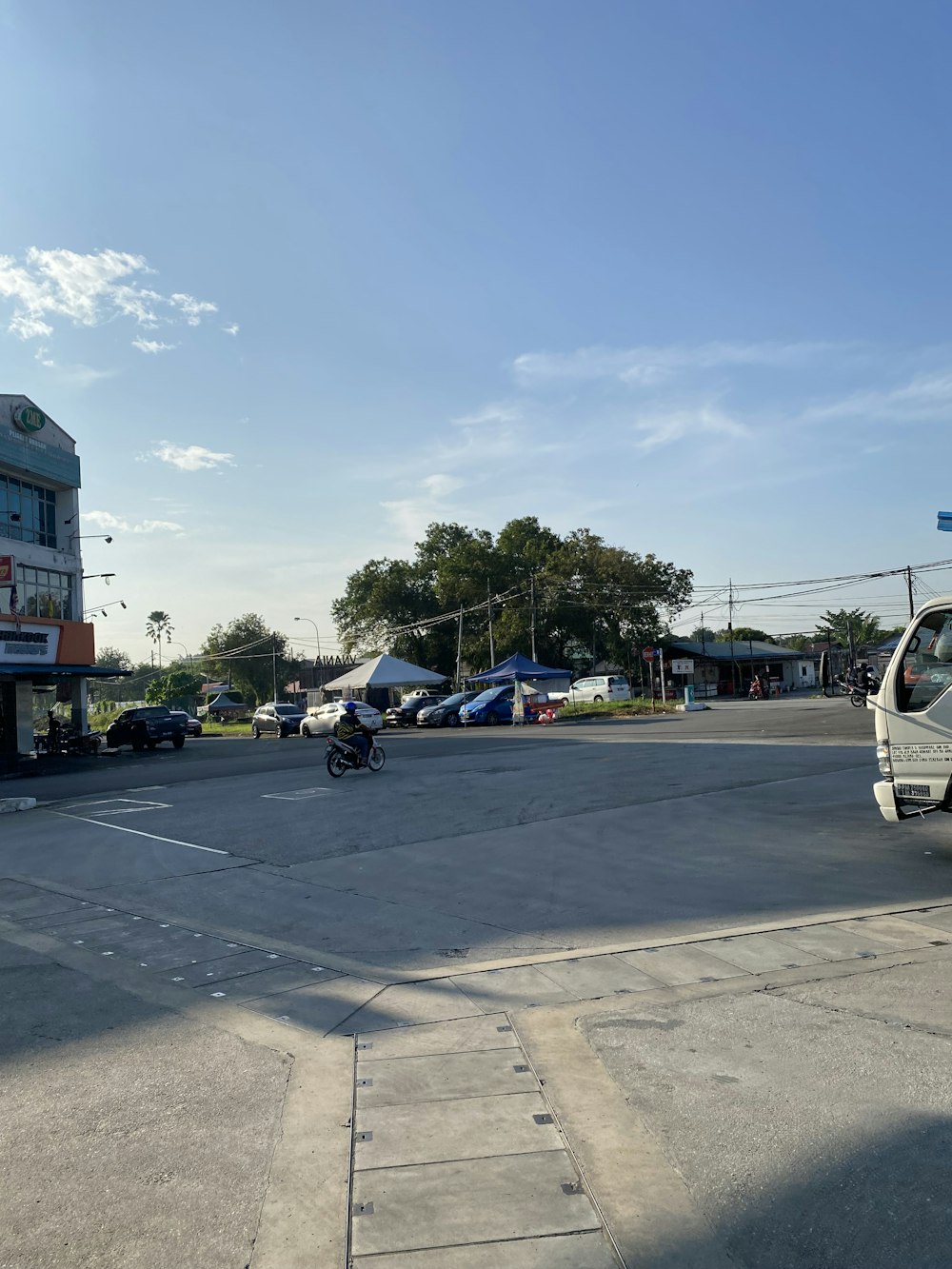 a white van parked on the side of a road