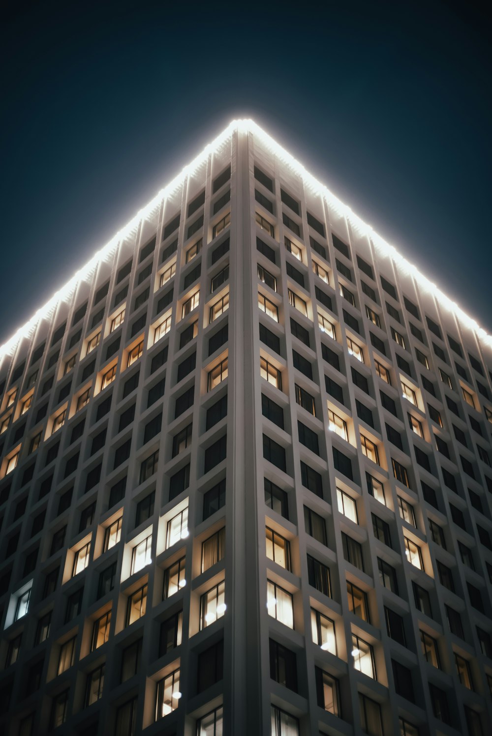 a very tall building lit up at night