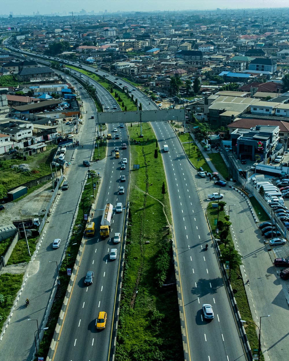 an aerial view of a highway in a city