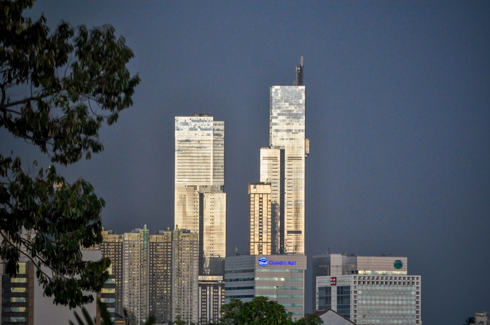 a view of a city with tall buildings