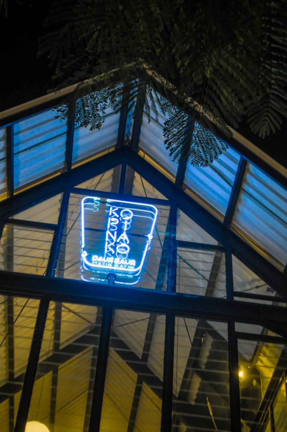 a building with a lit up sign inside of it