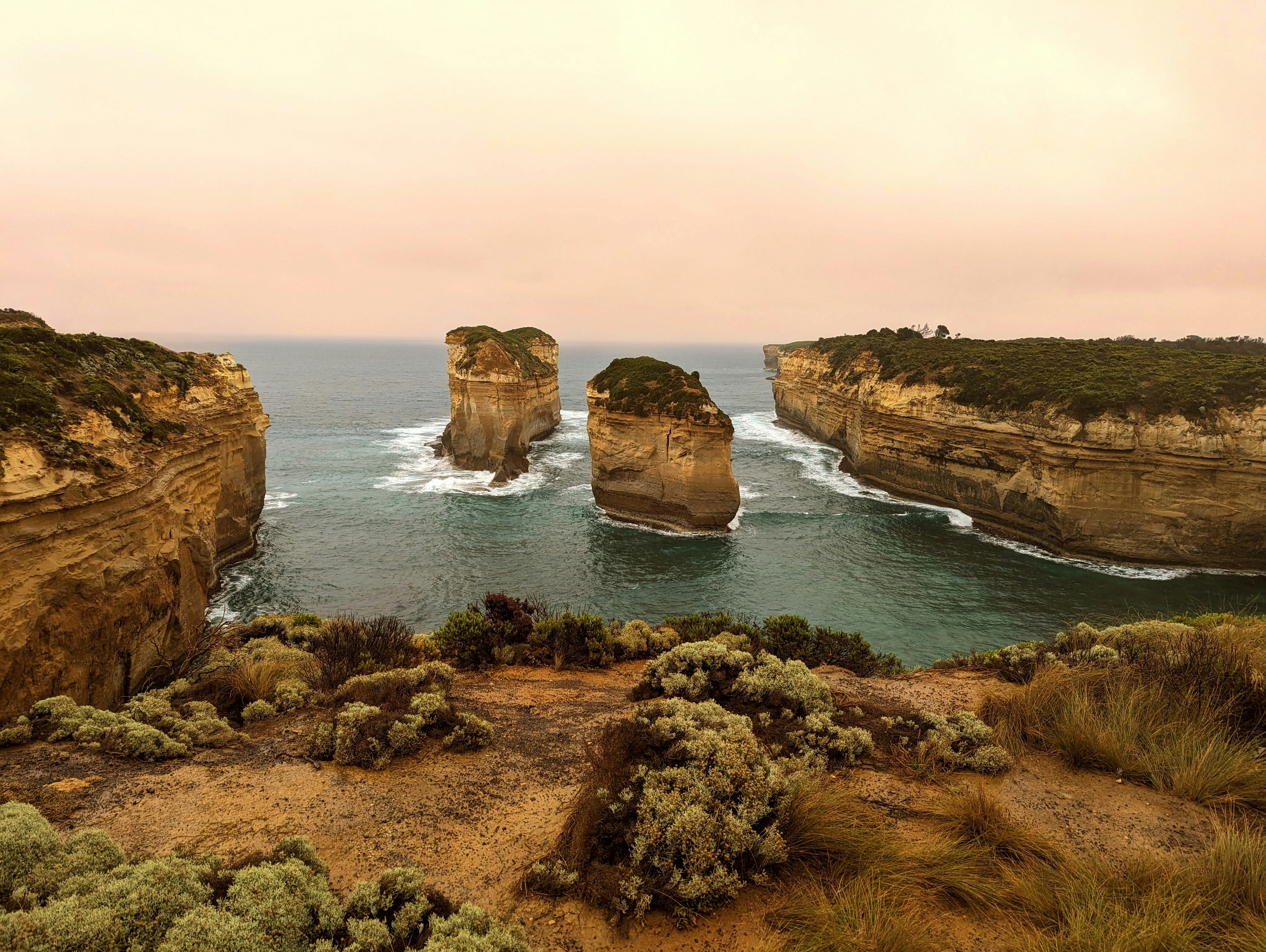 a view of the ocean from a cliff