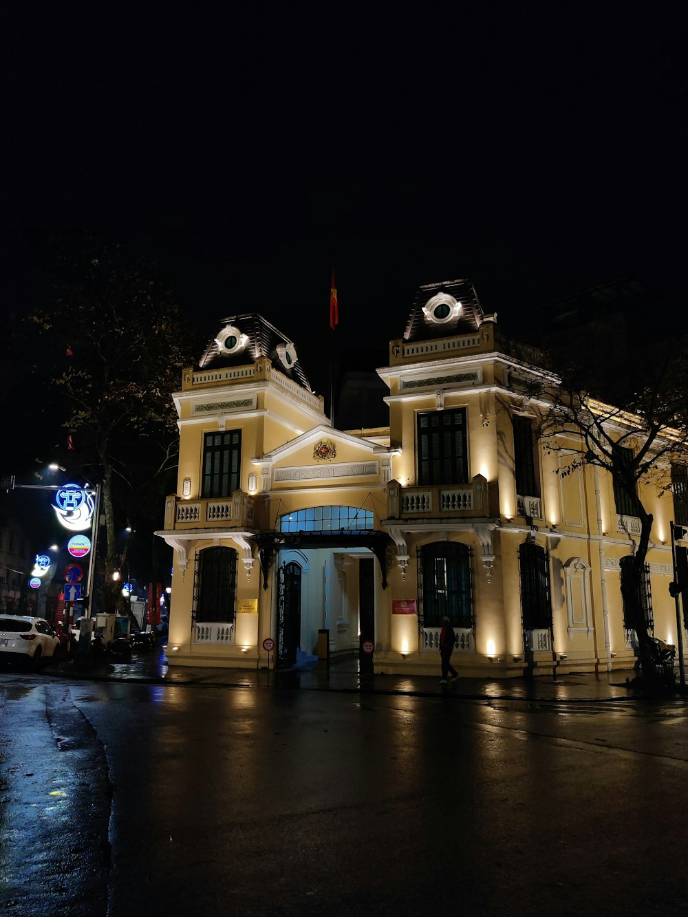 a large building lit up at night with lights