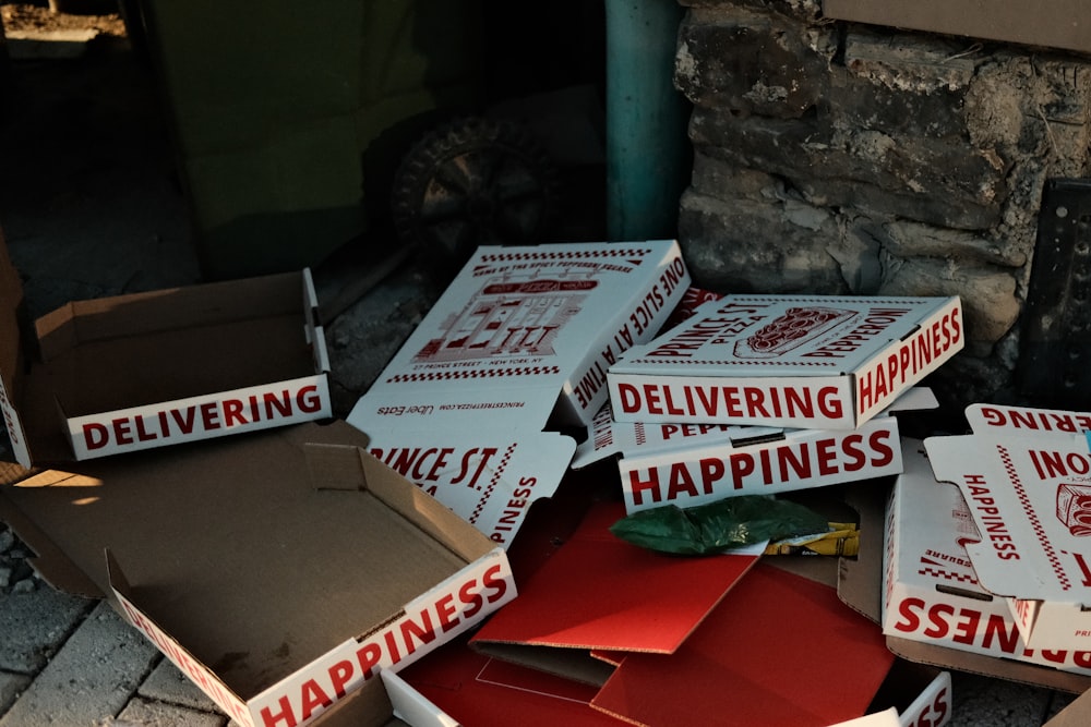 a pile of boxes that are sitting on the ground