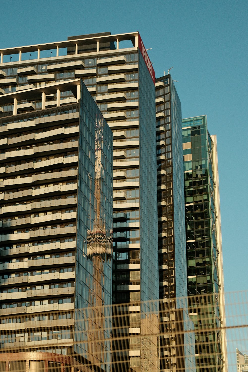 a tall building with a clock on the side of it