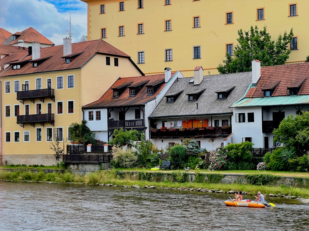 a couple of people in a small boat on a river