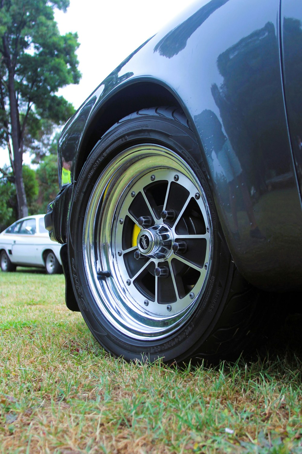 a close up of a tire on a car