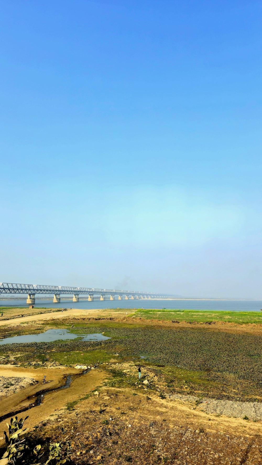 a view of a bridge over a body of water