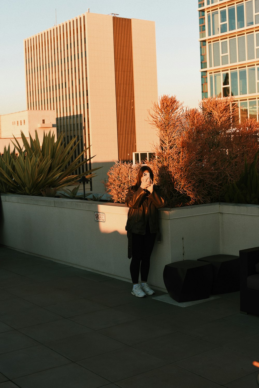 a person taking a picture of a building