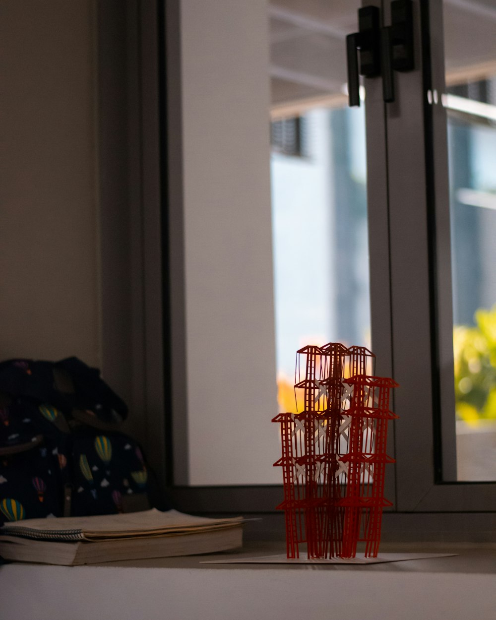 a stack of books sitting on top of a table