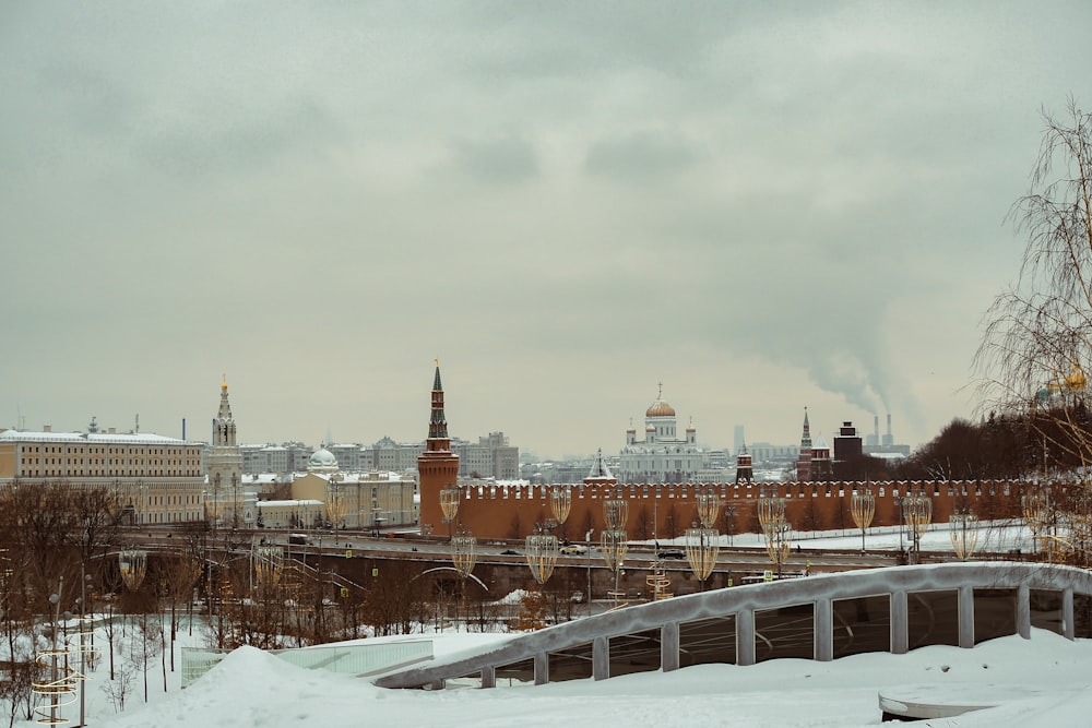 a view of a city with a bridge in the foreground