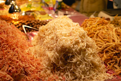 a pile of shredded food sitting on top of a table