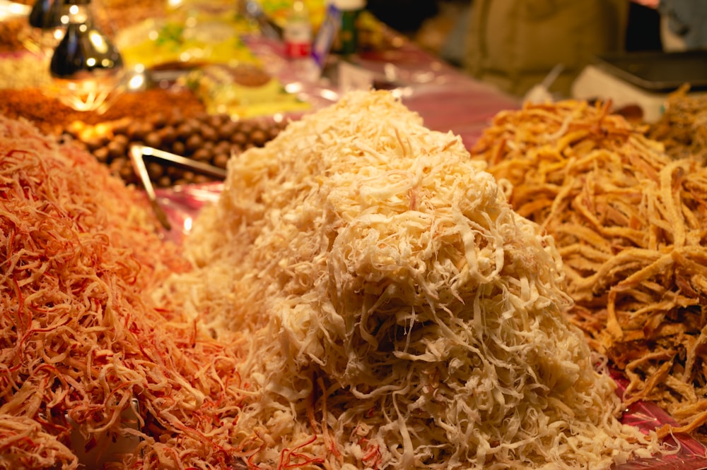 a pile of shredded food sitting on top of a table
