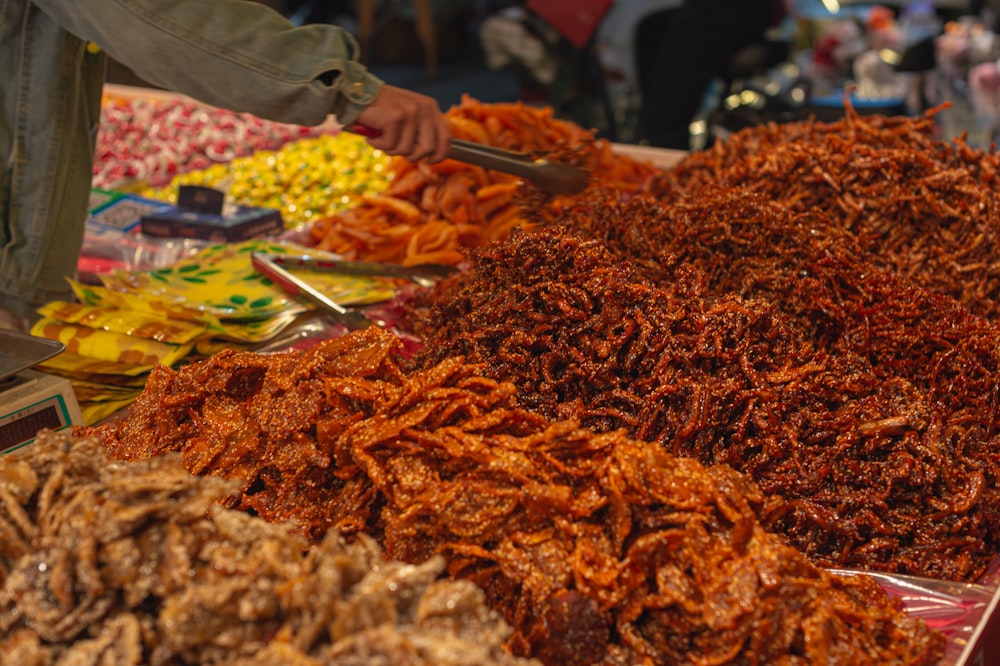 a pile of fried food sitting on top of a table