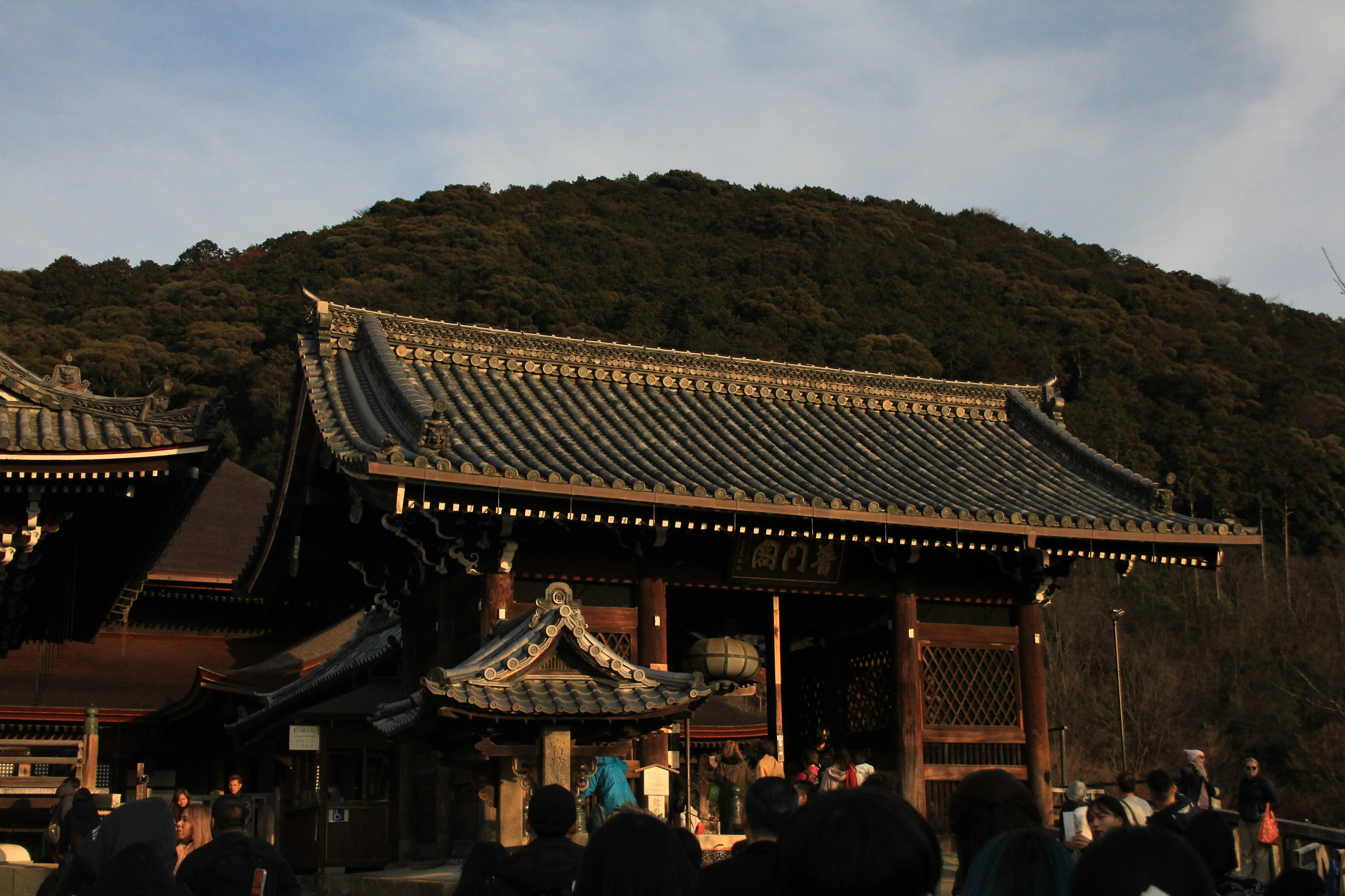 a group of people standing in front of a building