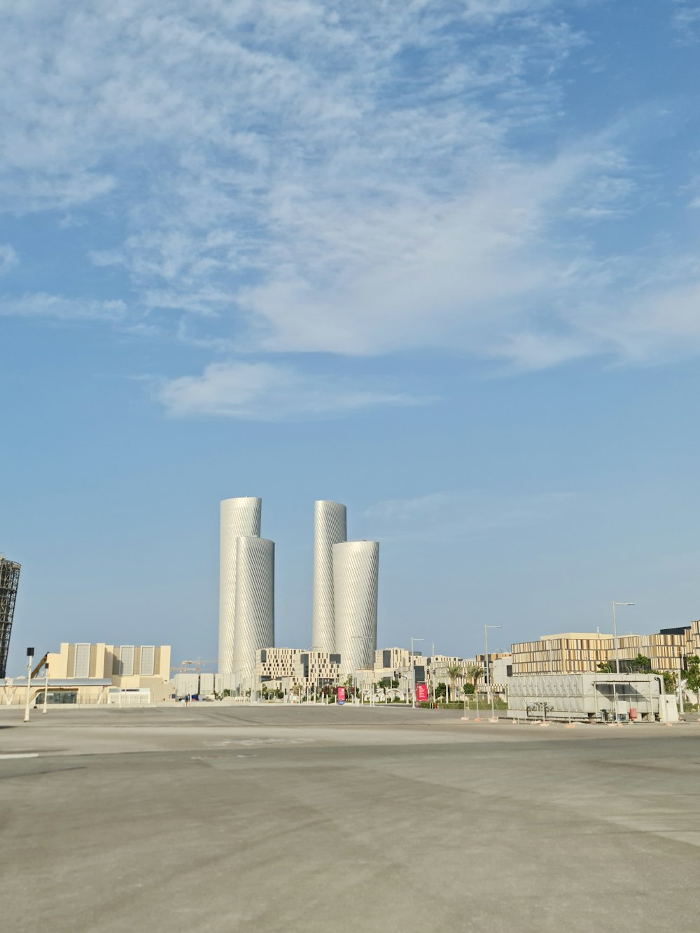 a parking lot with a building in the background