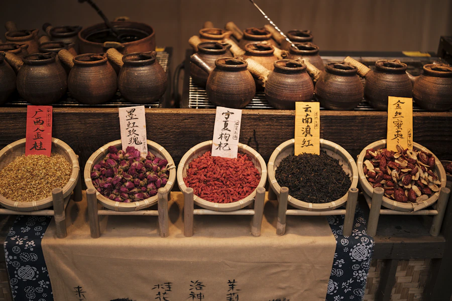Assorted dried Chinese herbs and spices in small bowls