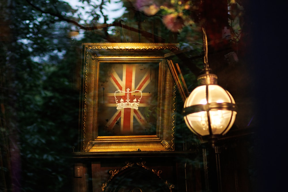 a picture of a british flag hanging on a wall