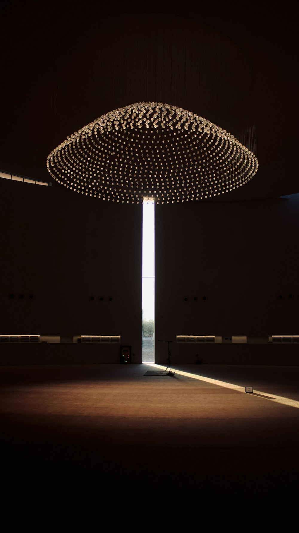 a large light fixture in the middle of a room