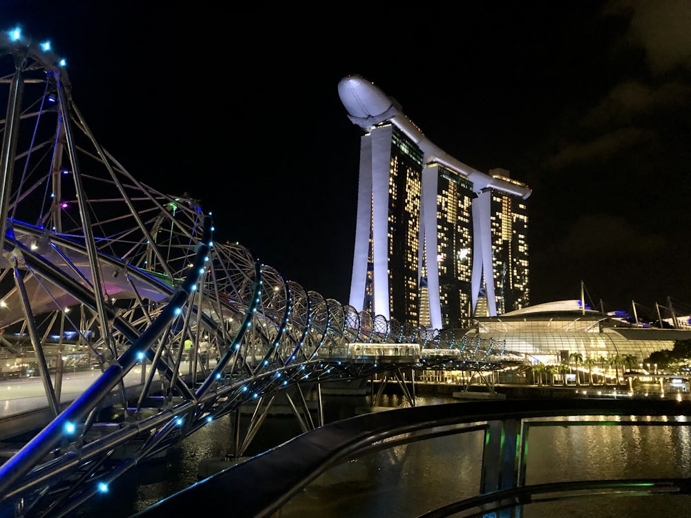 a bridge over a body of water at night