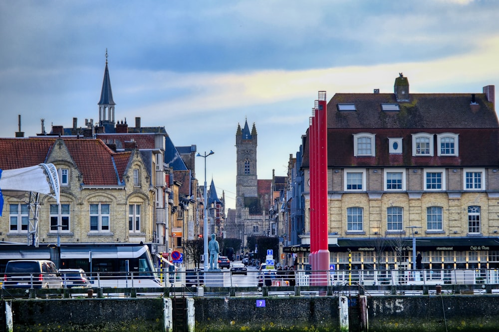 a group of buildings next to a body of water