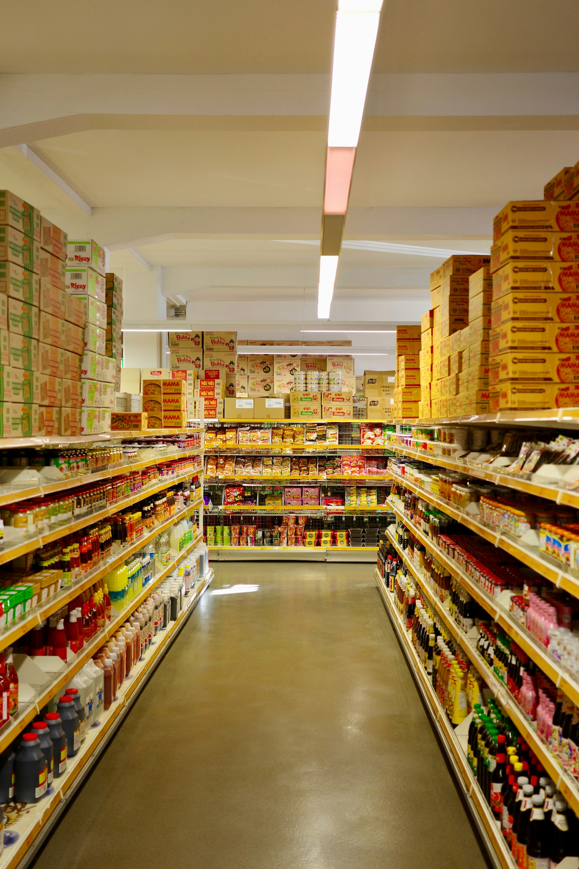 a grocery store aisle filled with lots of food
