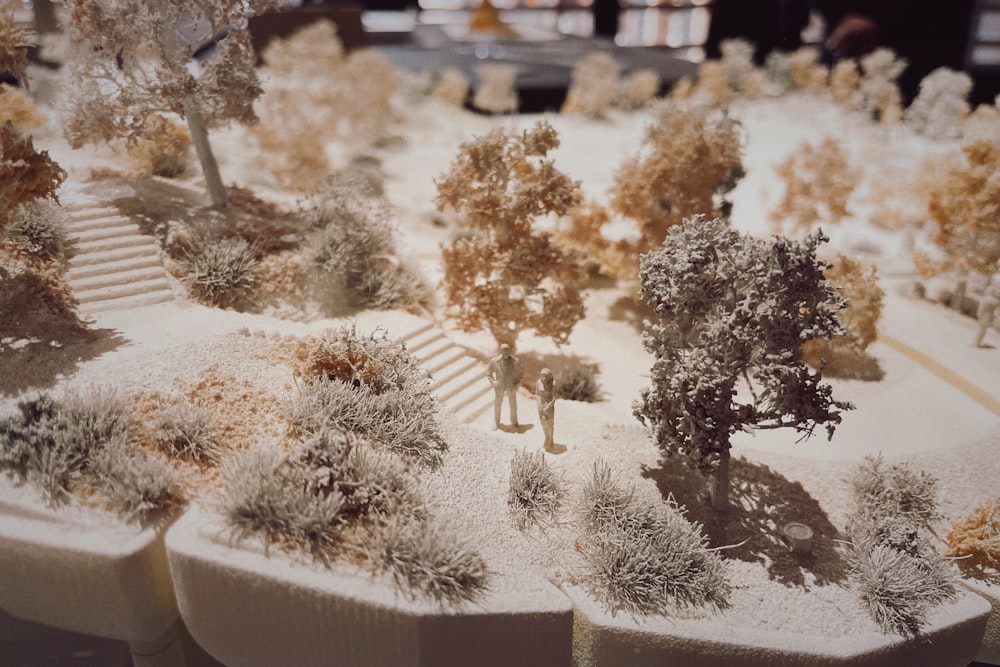 a model of a park with trees and benches