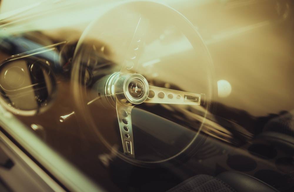 a steering wheel and dashboard of a car