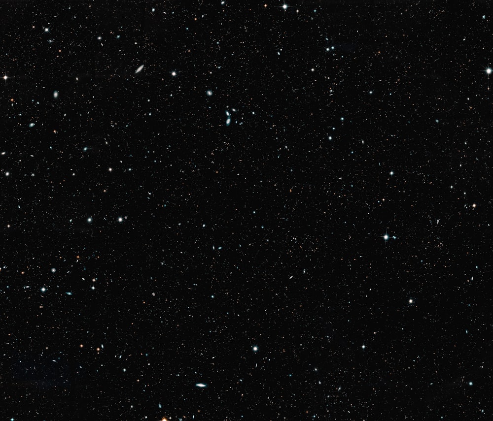 a black sky filled with lots of stars