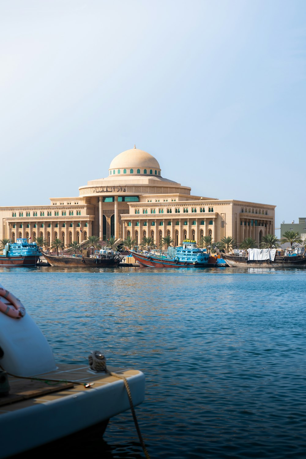 a large building sitting on top of a body of water