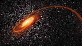 a very bright orange object in the middle of the night sky