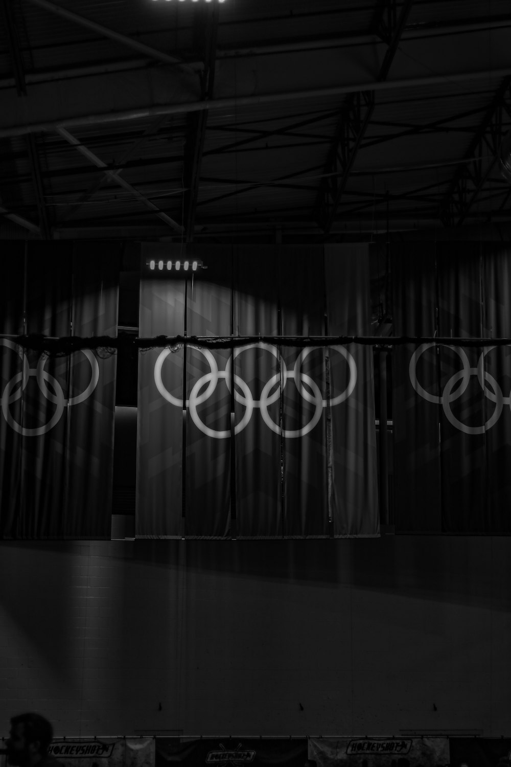 a black and white photo of the olympic logo