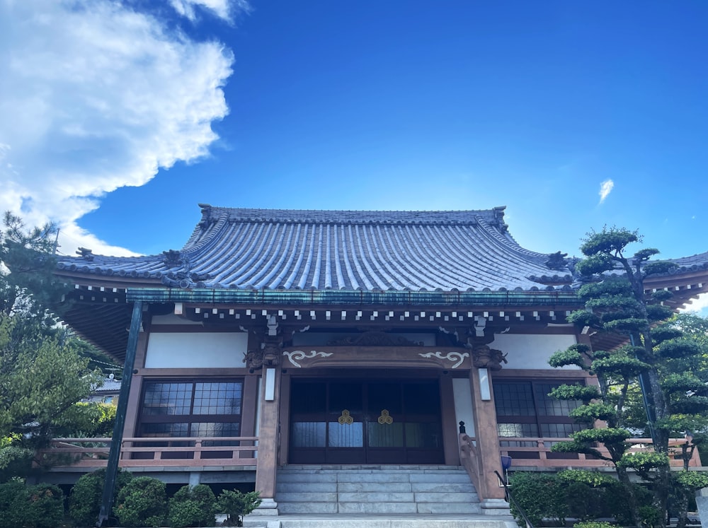 a building with a blue sky in the background